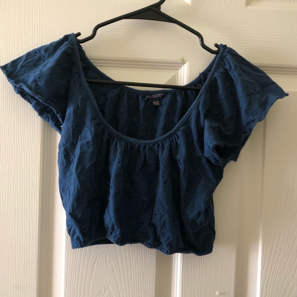 off the shoulder cropped navy blue shirt